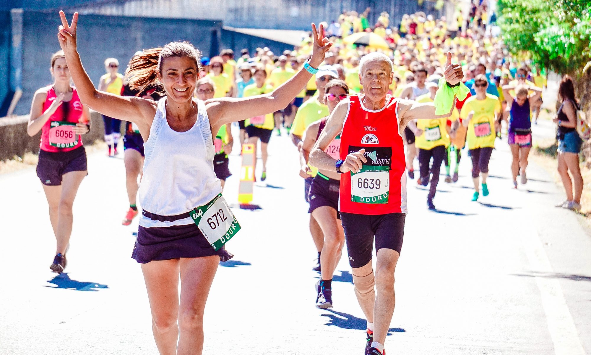 Canva - Female and Male Runners on a Marathon